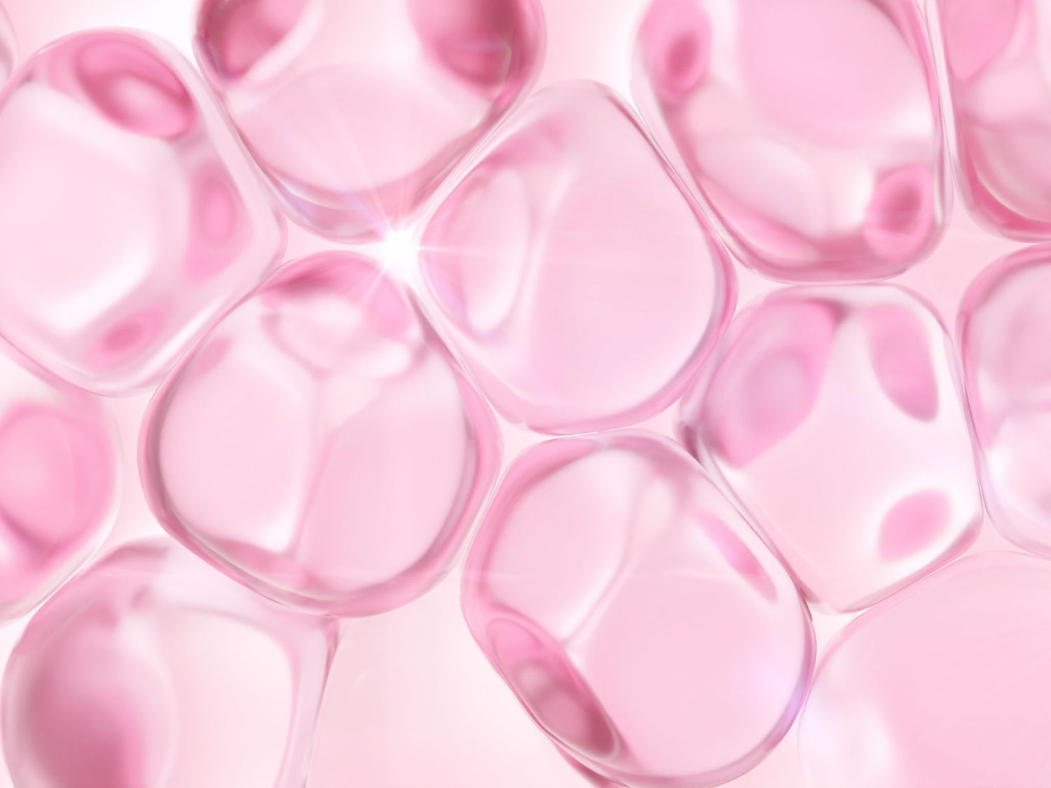 Close-up of pink collagen-like gel bubbles representing ways to boost collagen production
