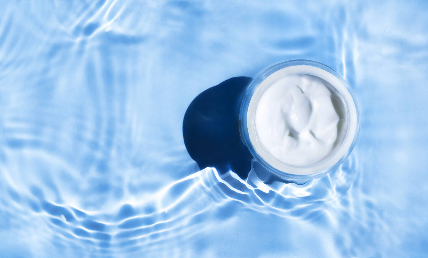 Glistening cream in water symbolizing the hydrating power of glycerin