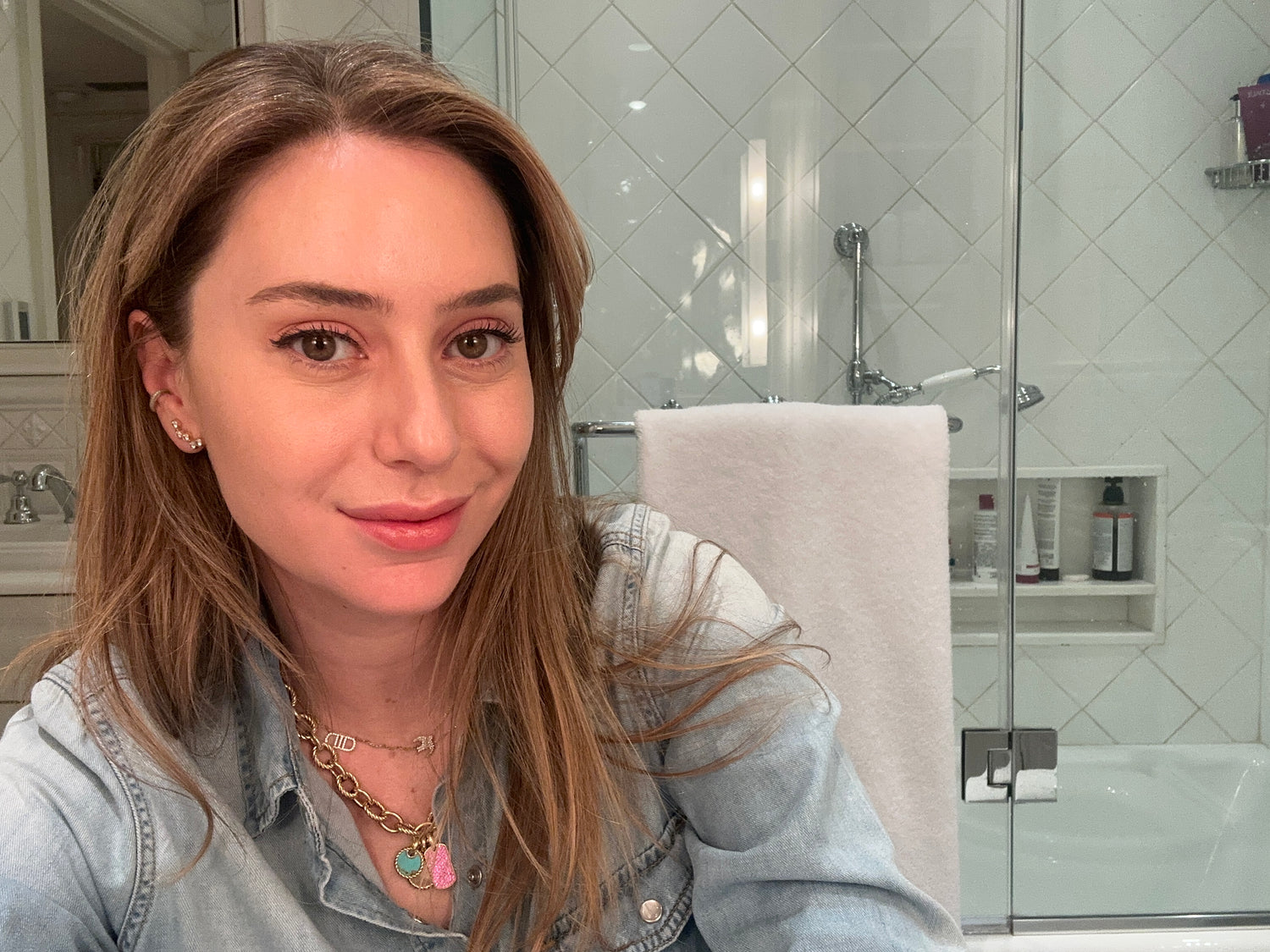 Dr. Shereene Idriss in her bathroom, sharing a 5-minute morning skincare routine for an effective and simple regimen