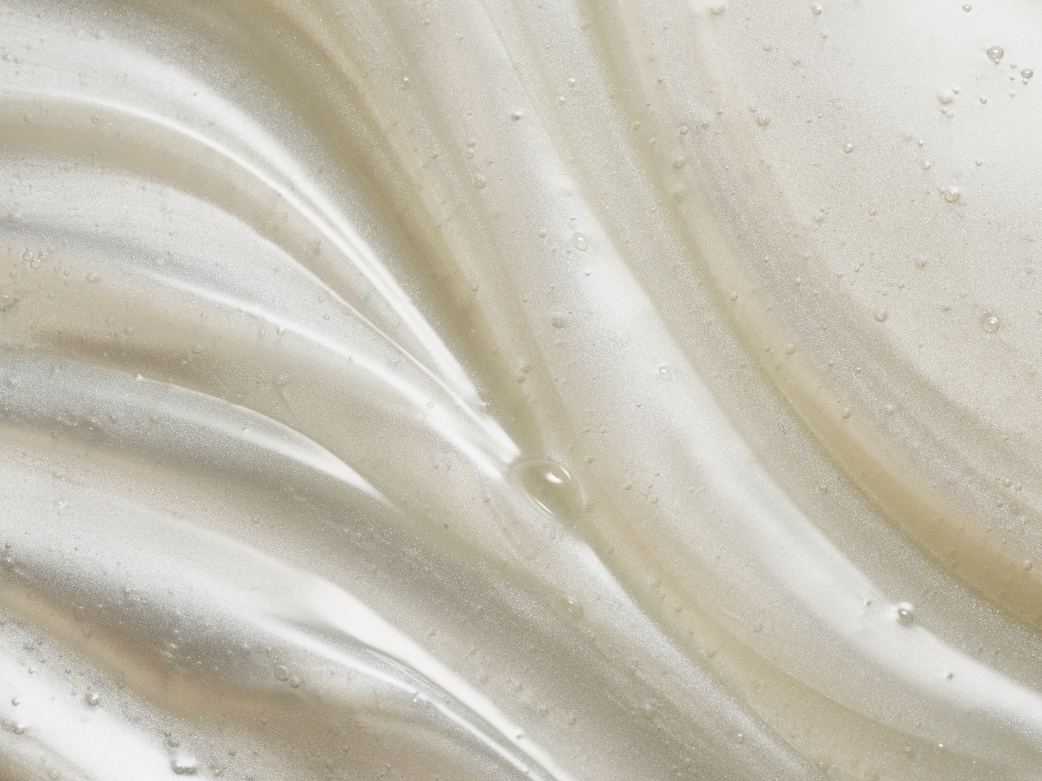Swirl of a creamy product on an article about Dr. Shereene Idriss' winter skincare hacks for dry skin
