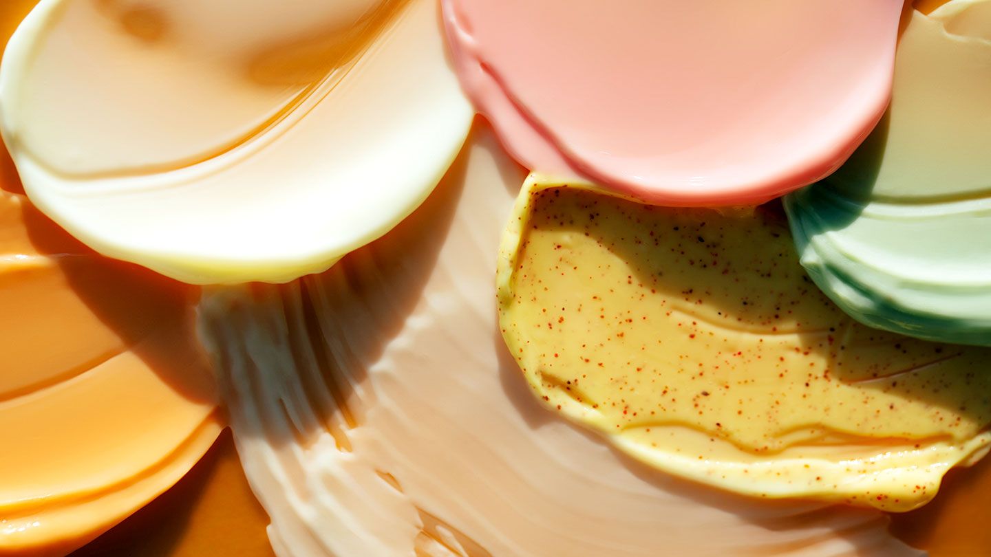 Colorful skincare creams representing tween skincare habits and routines