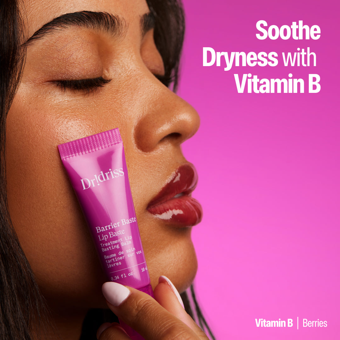 Model holding the Vitamin B Lip Baste