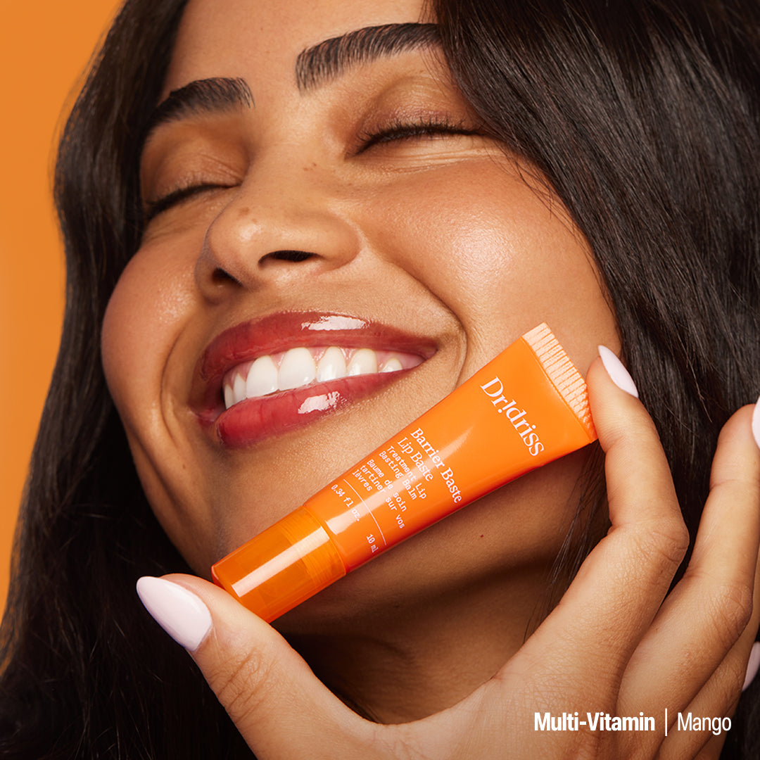 model holding the mango lip baste