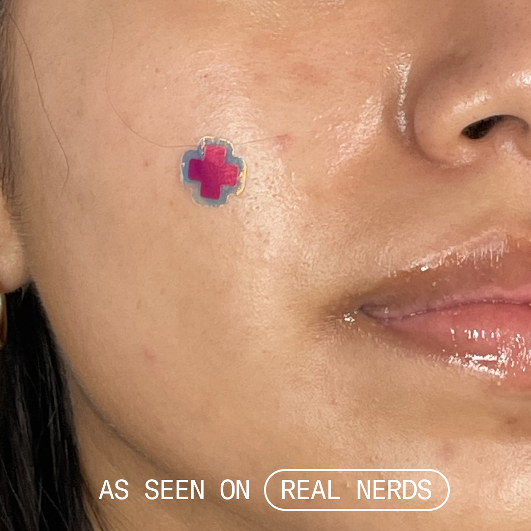 Another close up of a model wearing the pharmacy icon patch.