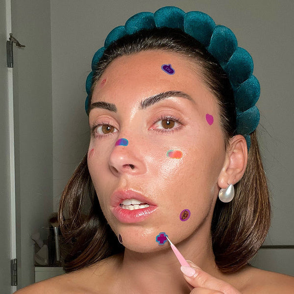 woman wearing the pimple patches