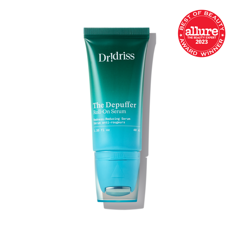 A close-up of Dr. Idriss The Depuffer Roll-On Serum in its teal green tube, with an "Allure Best of Beauty 2023 Award" badge displayed