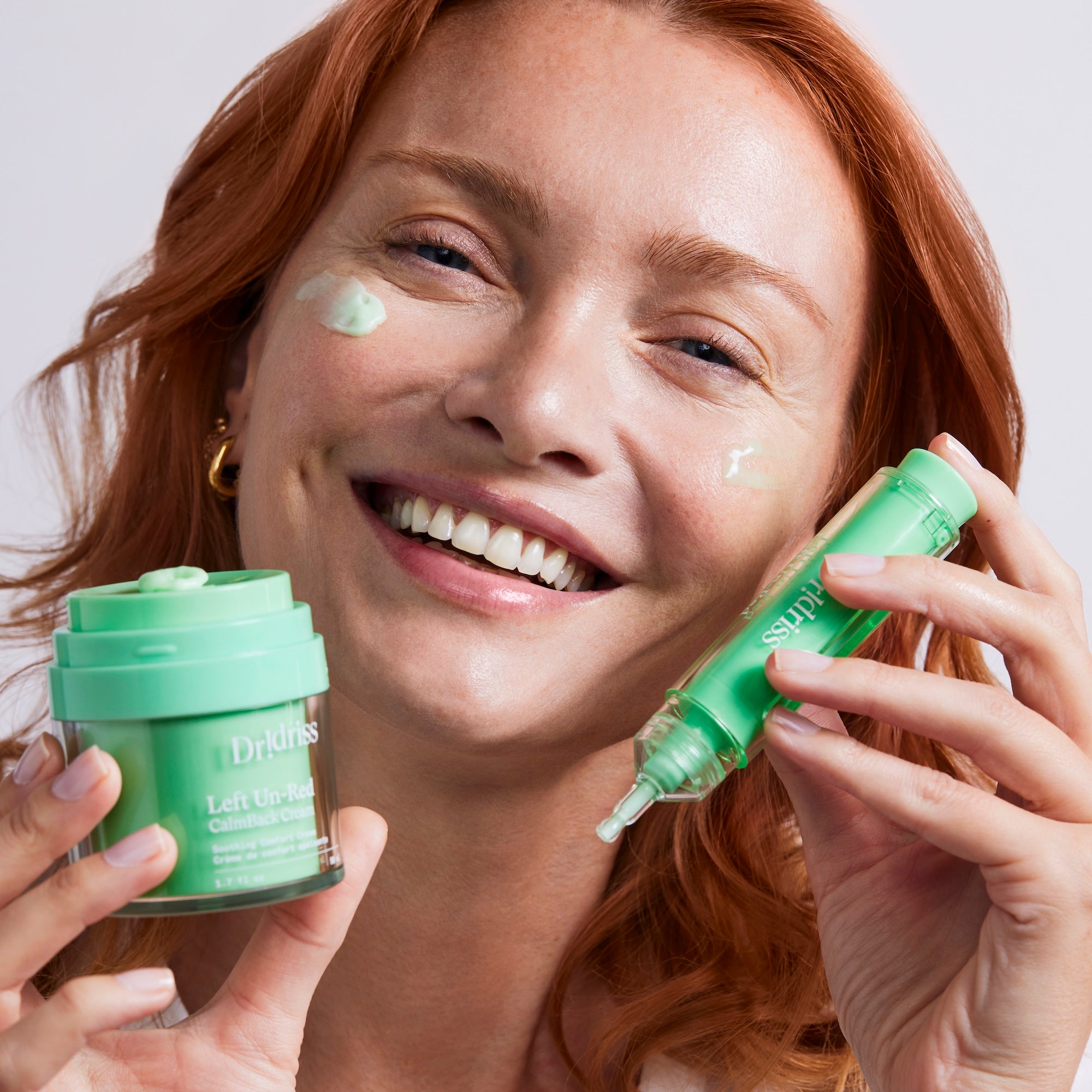 Model wearing the Left Un-Red Reducer Serum and CalmBack Cream, smiling.
