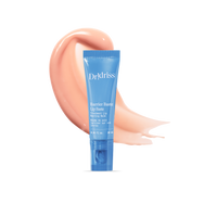 Barrier Baste Lip Baste treatment balm tube with glossy peach balm texture smear.