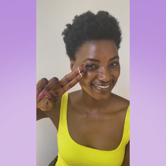Model applying Disco Block SPF 50, showing no white cast on her skin.