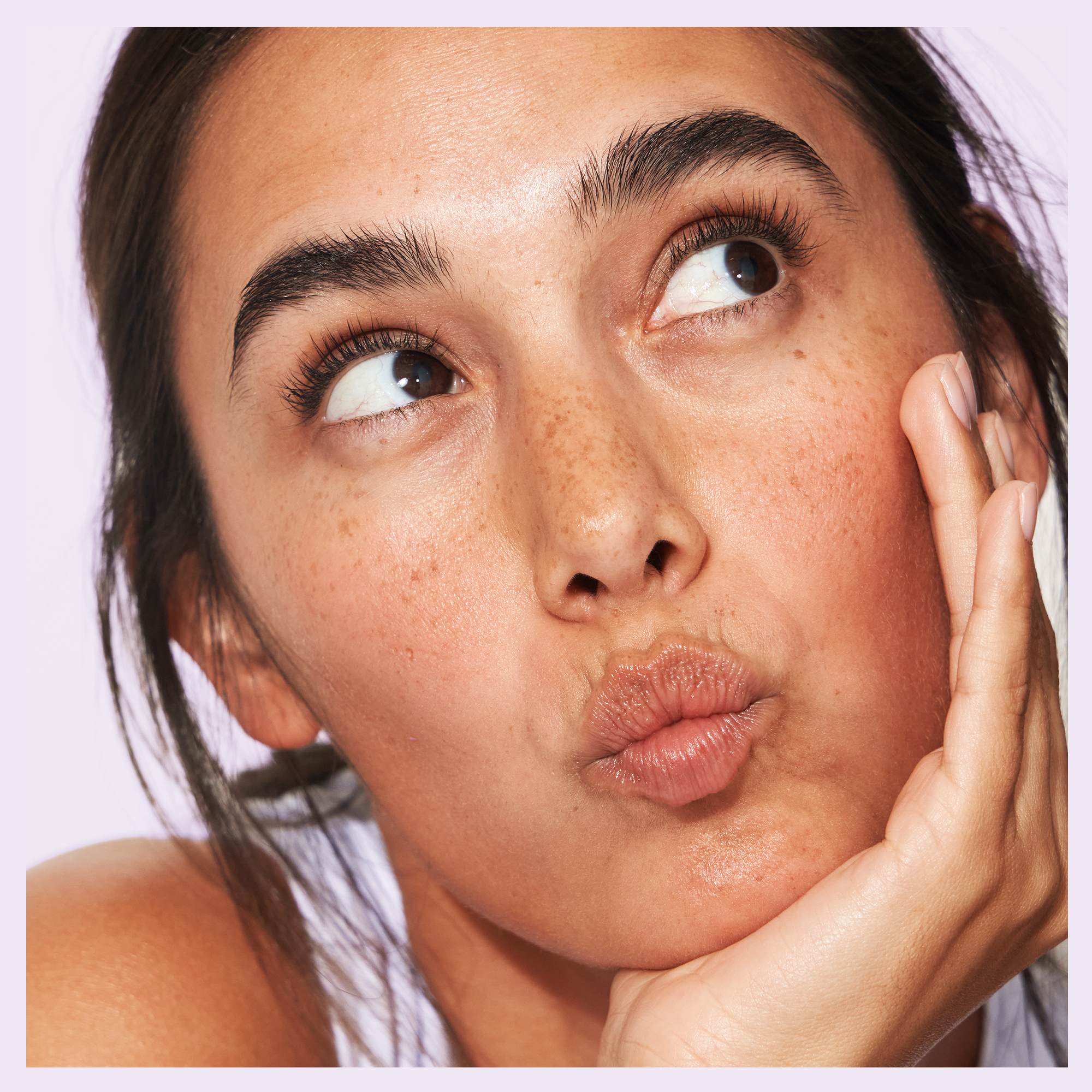 Close-up of model with glowing, even-toned skin